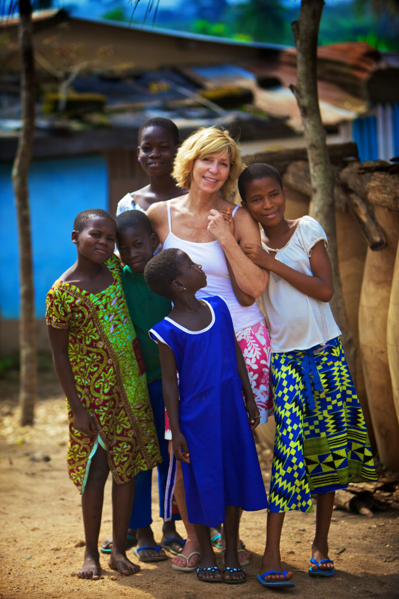 Dr. Mary J. Sanders volunteer and village girls
